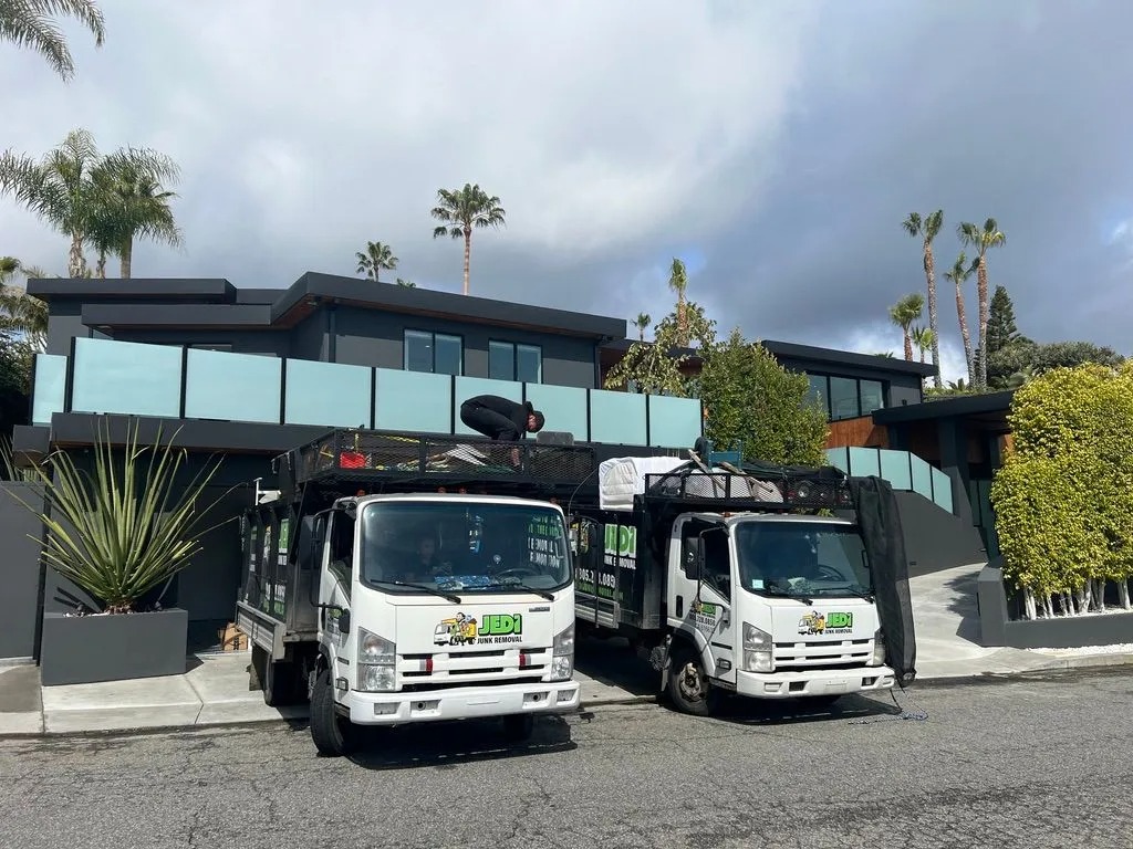 Two trucks parked in front of house