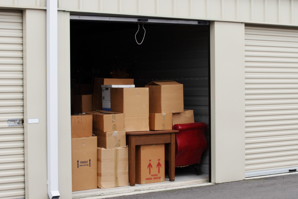 Storage unit with boxes and furniture